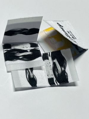 Özel dokuma giyim etiketleri giyim etiketleri 0.4mm Logo 5000pcs